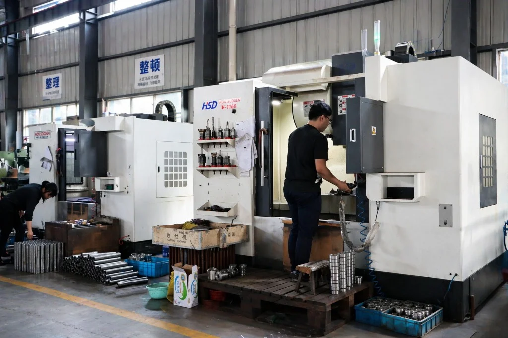 Taike Machinery CNC machining workshop for beverage filling machine parts manufacturing